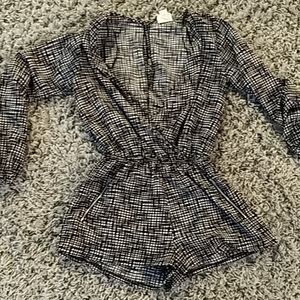 Split neck romper keyhole back zippered pockets